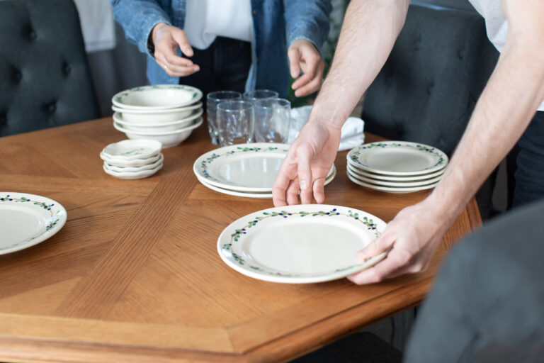 Home mockup 31 Friends setting a table with Blueberry Classic Dinnerware and coasters. Photo by Lauren Paige Photography.